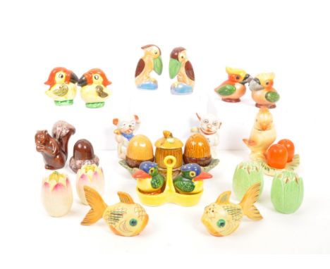 A collection of novelty ceramic salt and pepper condiment containers / shakers and creuset sets. Comprising of various bird p