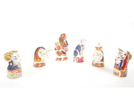 Royal Worcester - A collection of six porcelain china Royal Worcester candle snuffers figures. Comprising of: Dragon limited 