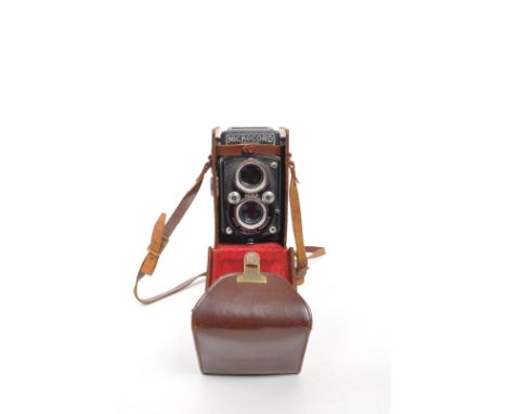 M.P.P Microcord - A mid 20th century M.P.P Microcord 6x6 120 film medium format TLR camera. The camera featuring 77.5mm F3.5 