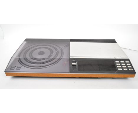 Bang &amp; Olufsen - Danish Maker - Beocenter 7002. A vintage 20th century record player turntable. With display, smoked plas