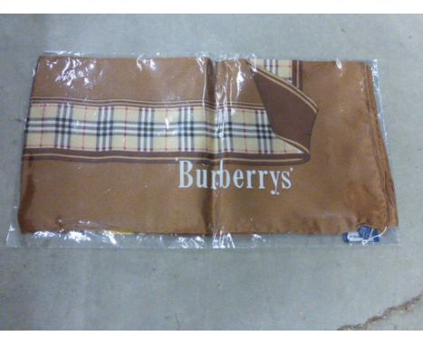 A brown vintage silk Burberry scarf 
