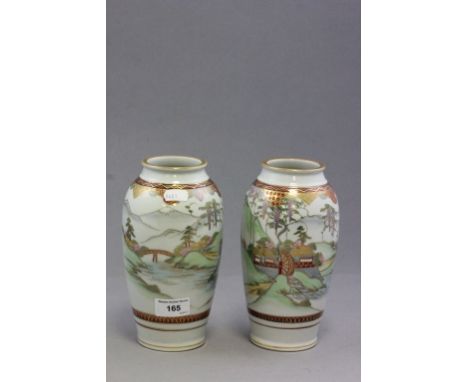 Pair of Japanese ceramic vases signed to base
