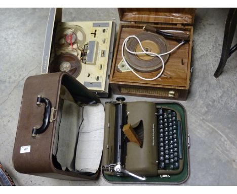 A record player, typewriter and a reel to reel player 