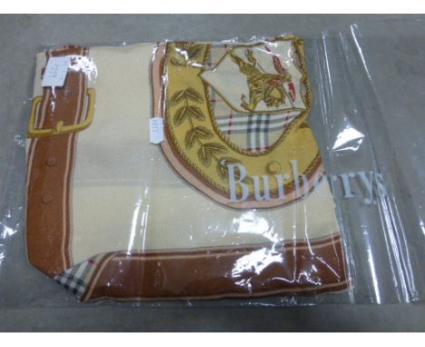 A cream vintage silk Burberry scarf 