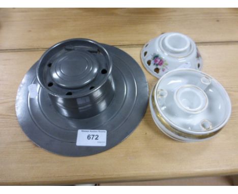 A pewter Arts and Crafts inkwell, along with two ceramic inkwells 