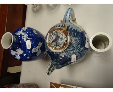 A Chinese blue and white spill vase, along with Chinese teapot and vase 