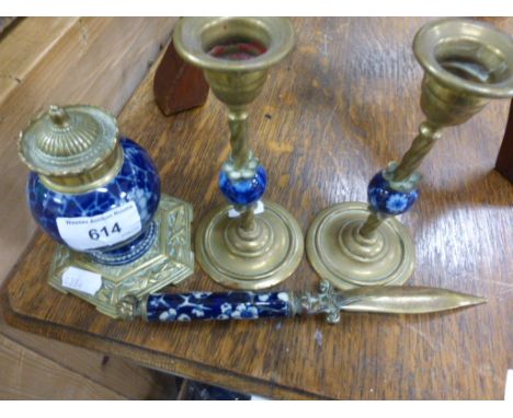 A matching brass and ceramic inkwell, candlesticks and paperknife