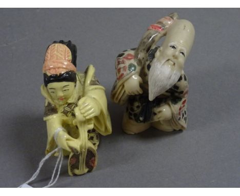 Two oriental figures to include lady playing harp and a traveller 
