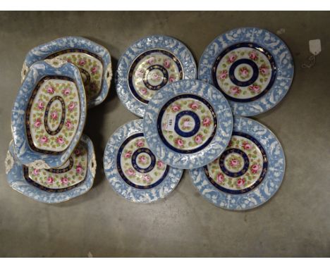 Three 19th century ceramic platters each on a blue ground decorated with birds, along with five matching plates 