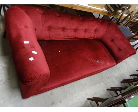 A chesterfield sofa, on turned mahogany legs 