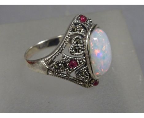 Silver and marcasite ring with large central opal