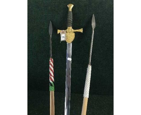A sword by Wilkinson and two tribal spears 