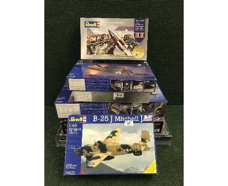 Seven Revell model kits - including B-25 J Mitchell, WW I fighter Asis, Honest John Missile etc. all parts boxed.