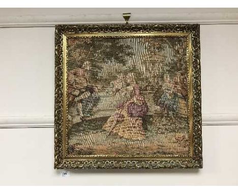 A gilt framed tapestry depicting figures in a garden