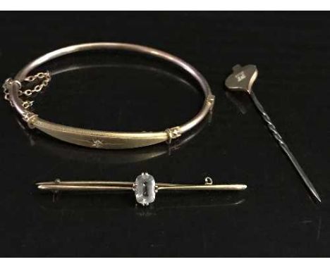 An antique 9ct gold bangle set with a diamond, a diamond set stick pin and a bar brooch set with an aquamarine, 9.1g gross