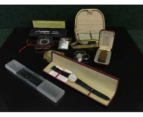 A tray of boxed Dunhill lighter, wrist watches, pens, compass etc 