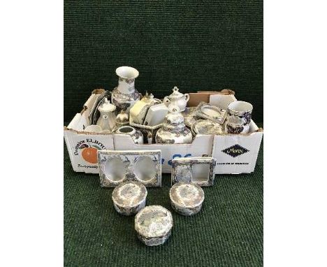 Four boxes of Japanese china, tins, coffee set, light shade, West German vases, crock pot etc.