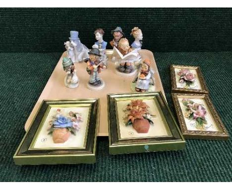 A tray of four Hummel figures, four Capo di Monte framed panels, two dogs etc 