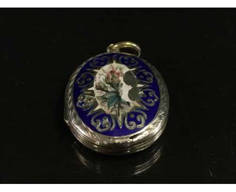 An enamel 9ct gold back and front locket.