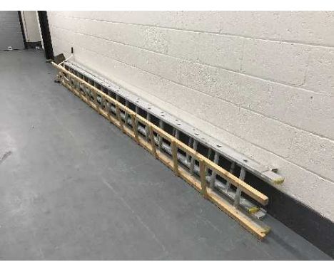 An aluminium extension ladder together with a roof ladder