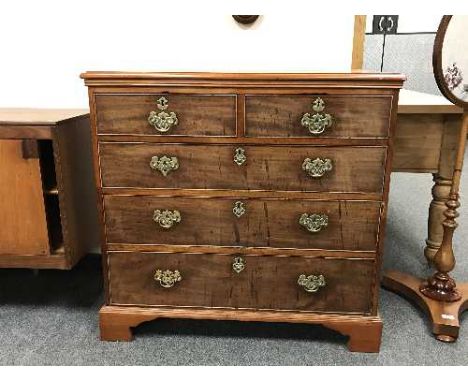 A Georgian mahogany  chest of five drawers on bracket feet