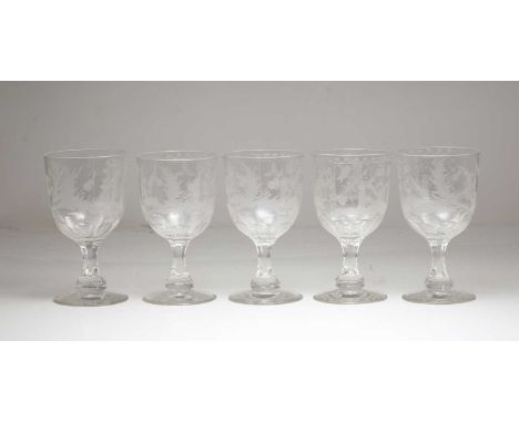 A set of five Masonic glass goblets, 20th century, the bell form bowl with etched Masonic emblem detail on facetted stem and 