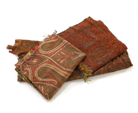 A group of three paisley shawls,  comprising: a 19th century example, probably Scottish, woven with repeating boteh motifs, i