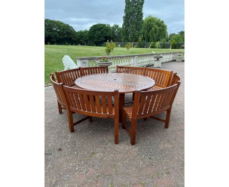 A Westminster teak garden suite of four benches and a circular table, modern, benches, 176cm wide table, 180cm diameter (5)Co
