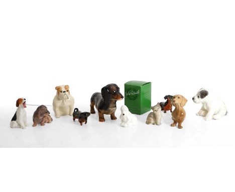 A Royal Doulton model of a Jack Russell, 7cm high, together with a Beswick model of a bulldog, 13cm high, a Royal Copenhagen 