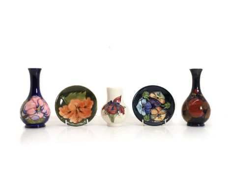 A collection of Moorcroft pottery items, 20th century and later, various dates, comprising a Pomegranate vase, 15cm high, a M