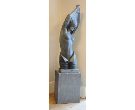A large grey marble figure, of recent manufacture, of a lady removing her top, raised on a plinth base,  167.5cm highConditio