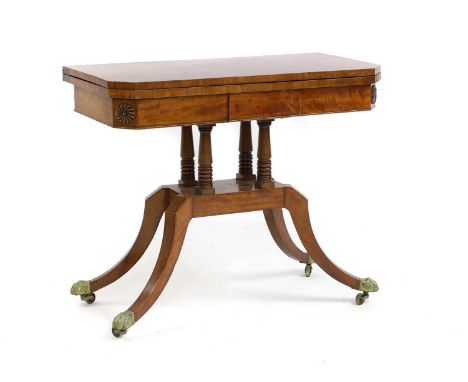 Regency mahogany card table, raised on four downswept legs on brass lion paw feet,89cm wide44cm deep75cm high