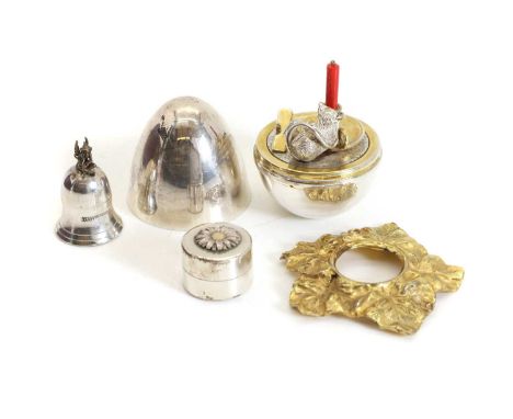 A silver gilt 'surprise egg', by David Rhys Mills, London 1996, the plain bodied egg opening to reveal a gilded interior with