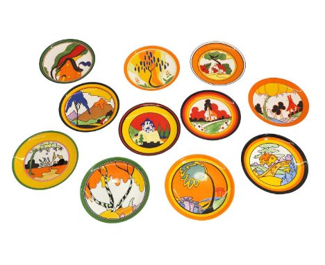 ▲ A set of eleven Clarice Cliff plates, designed for Wedgwood, a set of eleven Bizarre plates, comprising 'Windbells', 'Red R