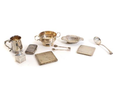 A collection of silver items, comprising a twin handled sugar bowl, Birmingham 1932, three cigarette cases, the larger by Map