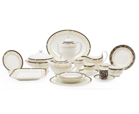 A 'Cornucopia' Wedgwood porcelain dinner and tea service,  comprising two covered tureens, 25cm wide, an oval platter, 40cm w