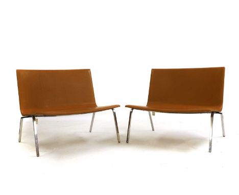 Pietro Arosio (Italian, b.1946), a pair of Tacchini 'XL' easy chair, each with leather upholstery, labelled,80.5cm wide63.5cm