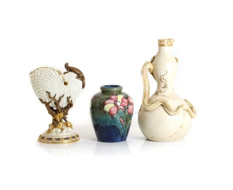 A Royal Worcester blush ivory jug,  in the form of a conch shell with gilt lizard to the side on a naturalistic base, 22cm hi
