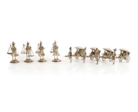 A group of eight Chinese silver figures, mid-20th century, to include examples of figures pulling carts,tallest 6.5cm4.5ozt (