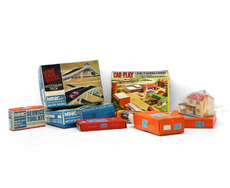 A collection of boxed 'Tri-Ang' Minic track and accessories, to include, service toolkit, humpback bridge set, checkpoint Bra