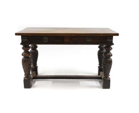 A carved oak table, 19th century, the three plank top, above two short drawers, to carved acanthus supports, united by a 'H' 