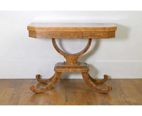A rosewood inlaid card table, early 19th century, the inlaid and banded top opening to reveal a baize playing surface, the ca