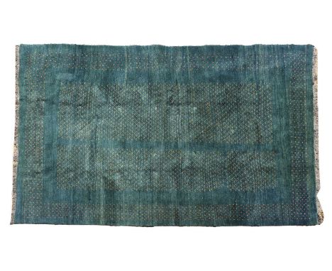 ​​A large Gabbeh carpet, of recent manufacture, with geometric motifs to a blue ground,397 x 271cmCondition ReportSome small 