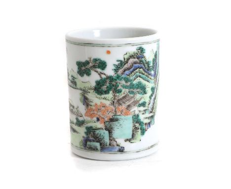 A Chinese wucai brush pot,  20th century, of cylindrical form, painted with a landscape, inscribed, 11.5cm high  Condition Re