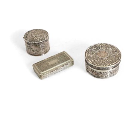 A silver cylindrical box and cover, possibly by Rosenthal, Jacob &amp; Co, tested as silver, the cover mounted with a coin wi
