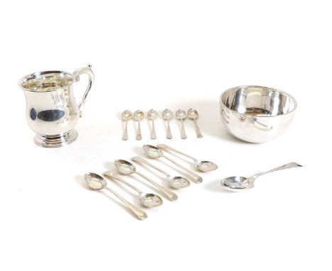 A collection of silver items, comprising a set of six teaspoons, 8cm long, by Thomas Bradbury &amp; Sons Ltd, Sheffield 1944,