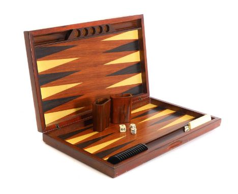 An inlaid wooden backgammon set, with counter and cups in a quarter veneered burr walnut case, 48.5cm wide60cm long3.5cm deep