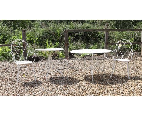 A collection of French wirework garden furniture, comprising two tables, on scroll supports,99cm diameter67cm high and two si