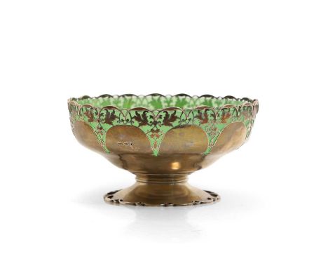 A silver centre bowl, by Mappin &amp; Webb, Sheffield 1945, with a pierced border and green glass liner,21.8cm diameter11.5cm
