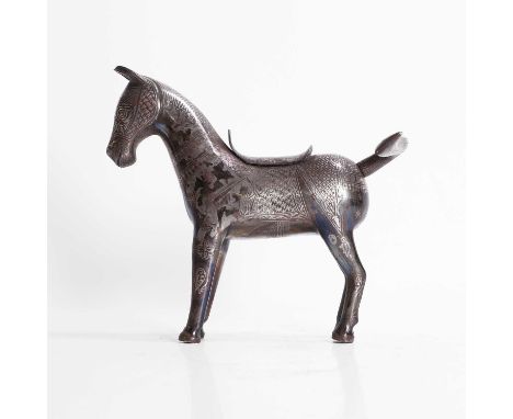 An Indo-Persian silver-inlaid and steel model of a horse, 20th century, the beast with its ears pricked forward and tail flar